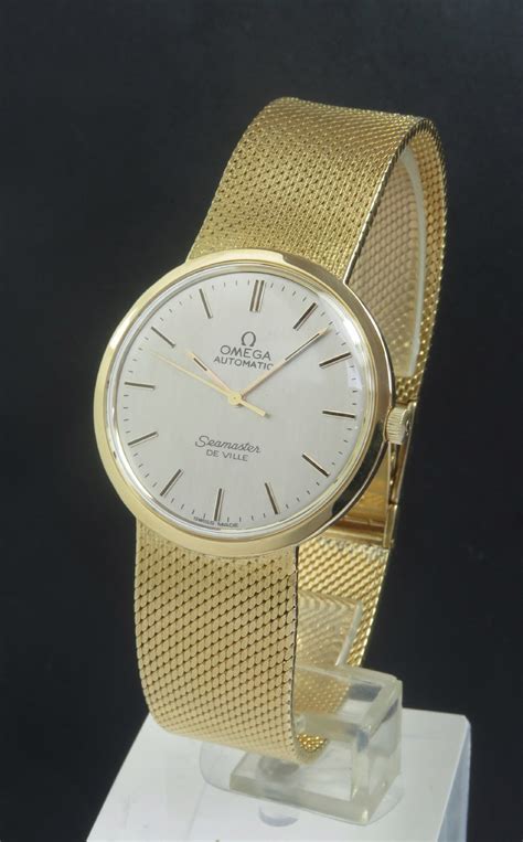 solid gold gents omega watches.